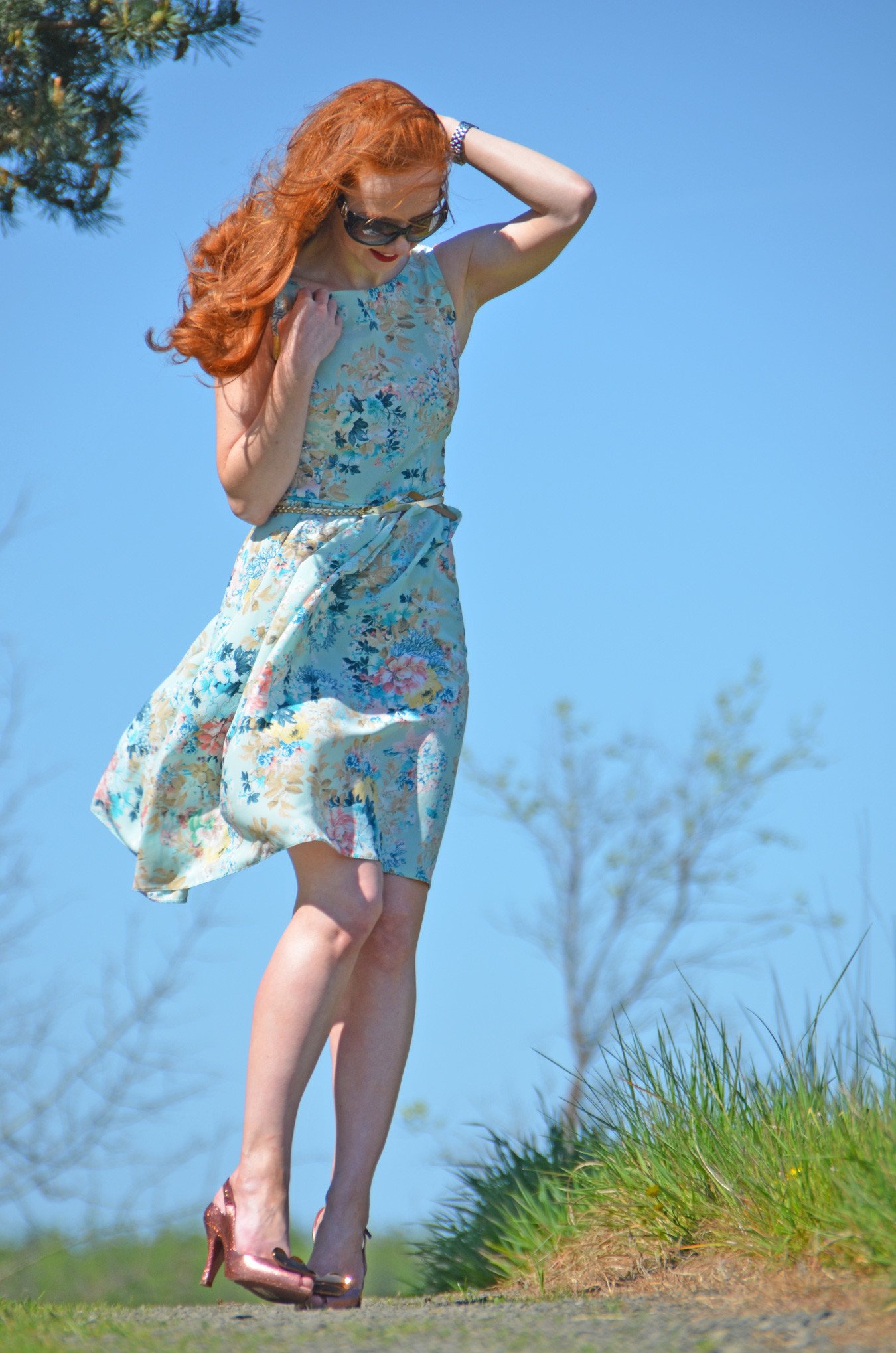 short floral dress on a windy day