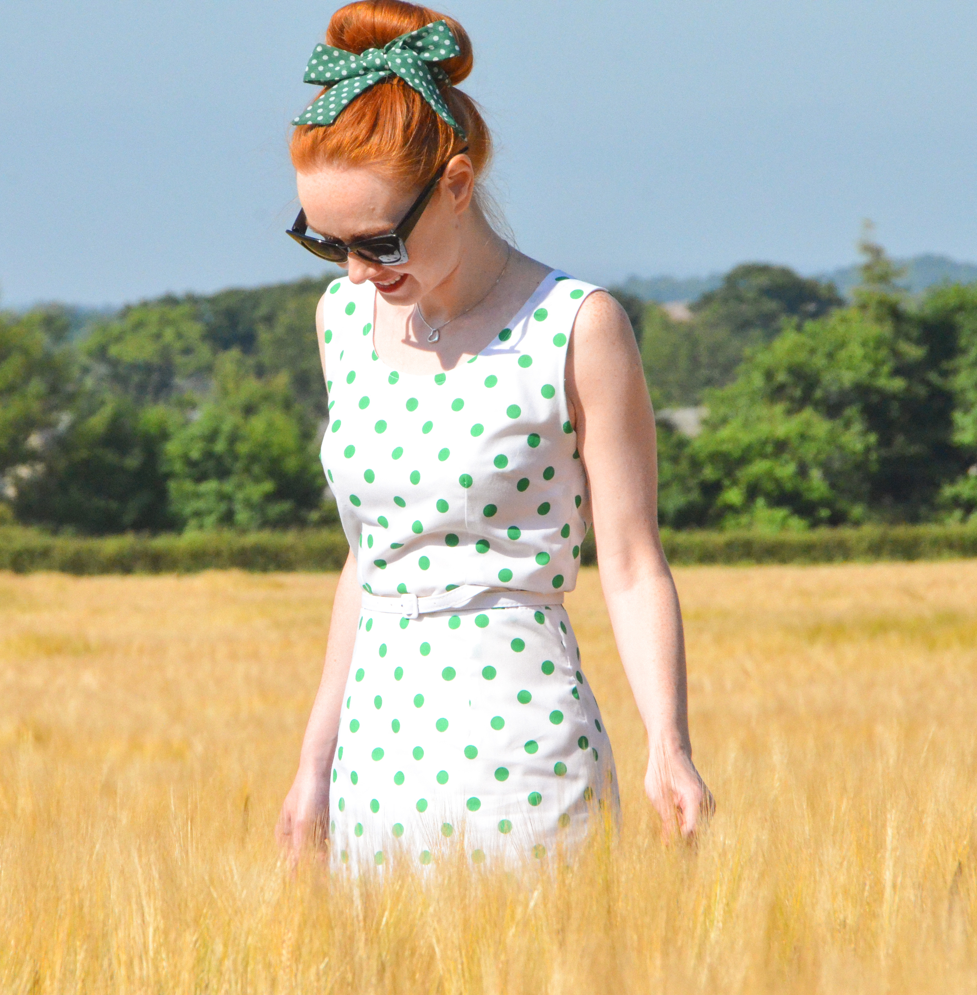 white and green polka dot wiggle dress