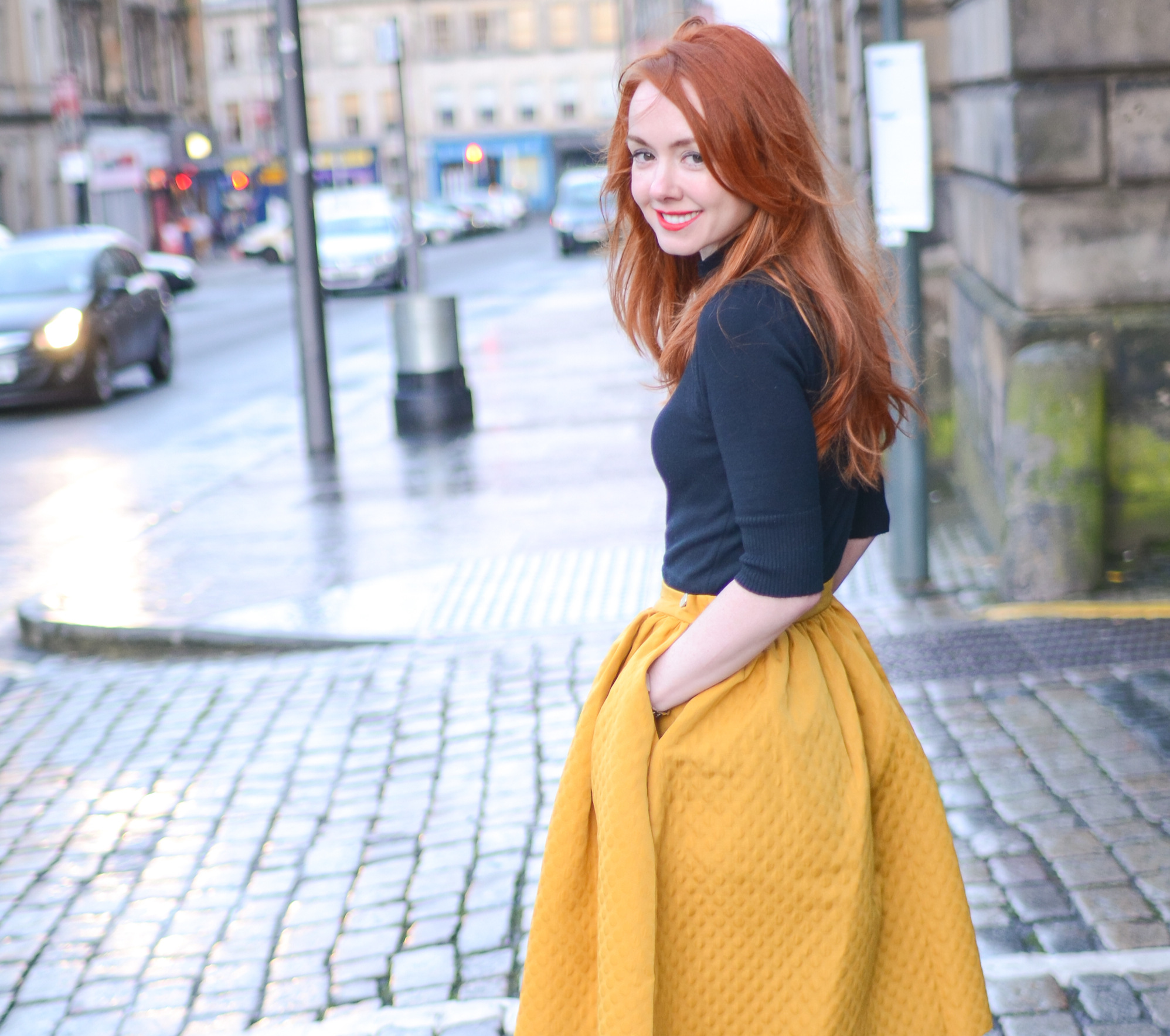 yellow skirt and black top