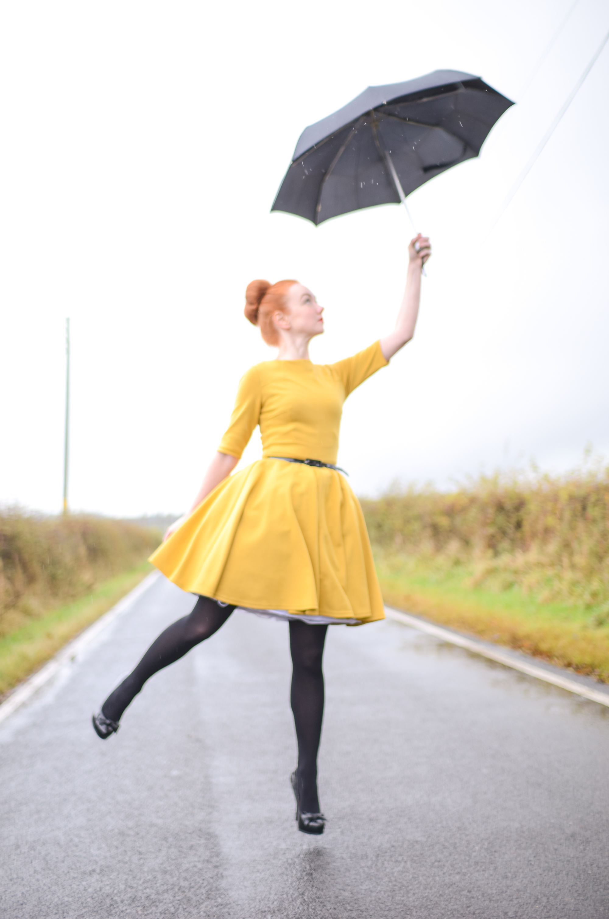 yellow dress in the rain