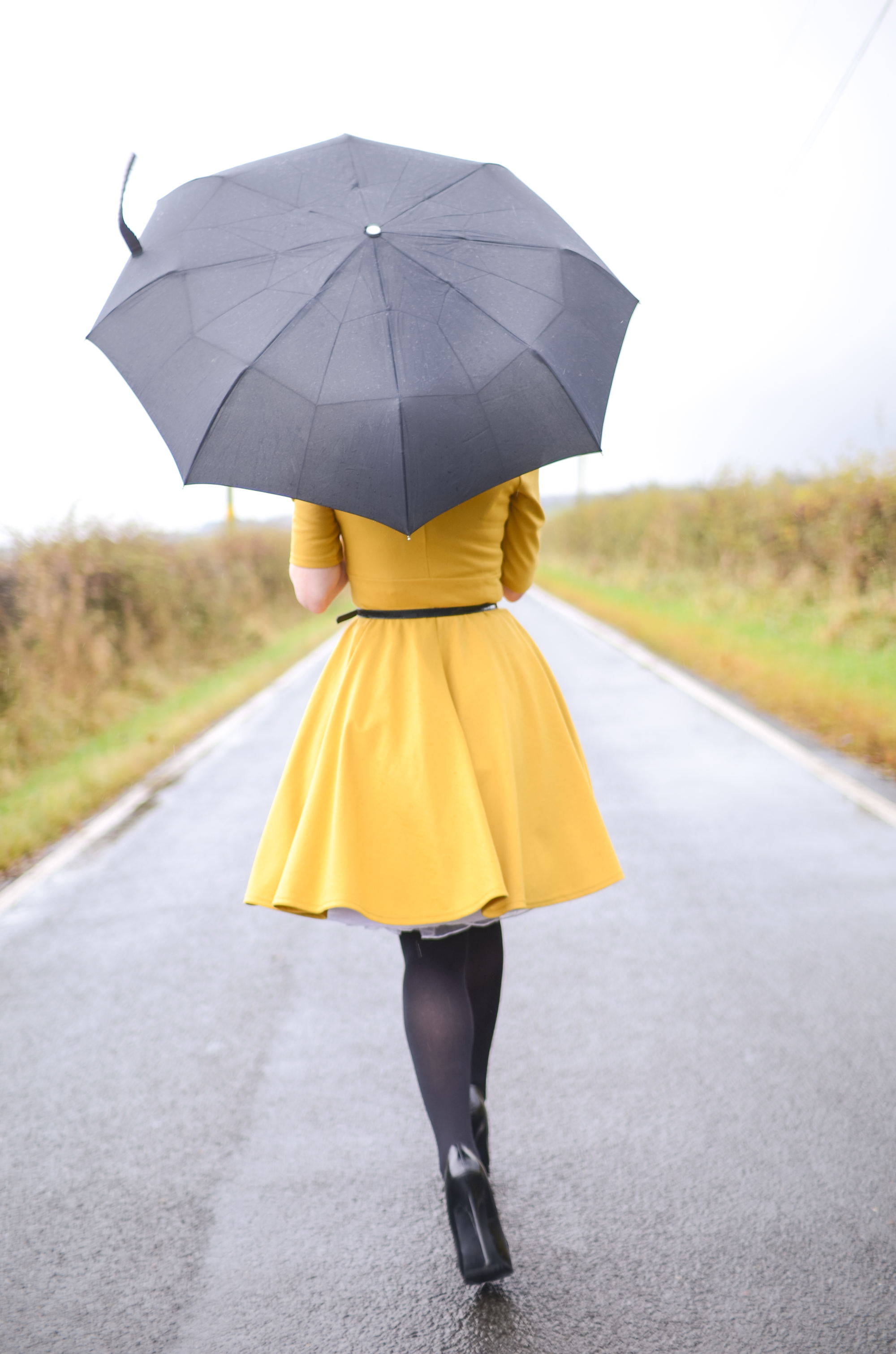 yellow dress in the rain