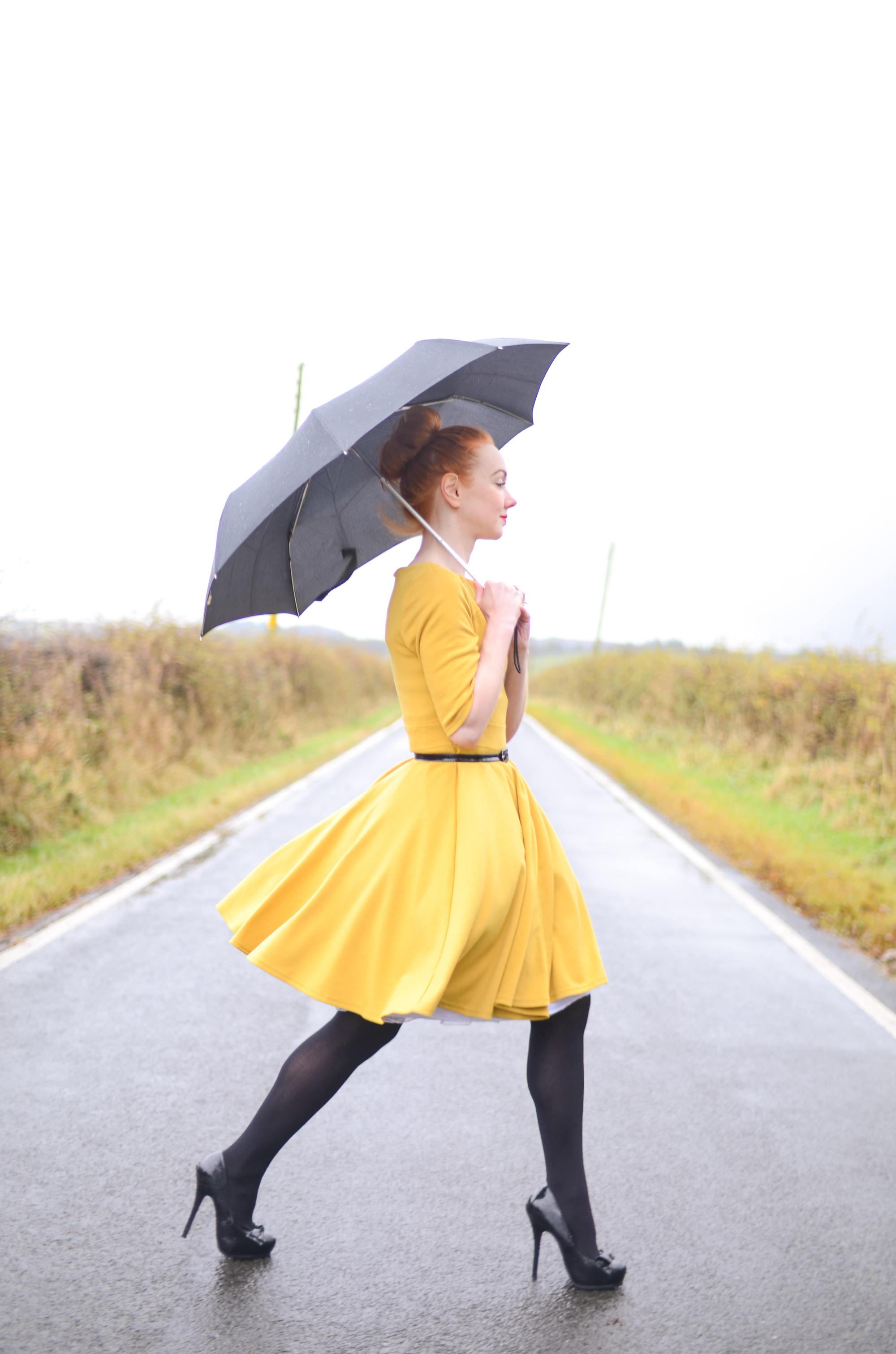 yellow dress in the rain