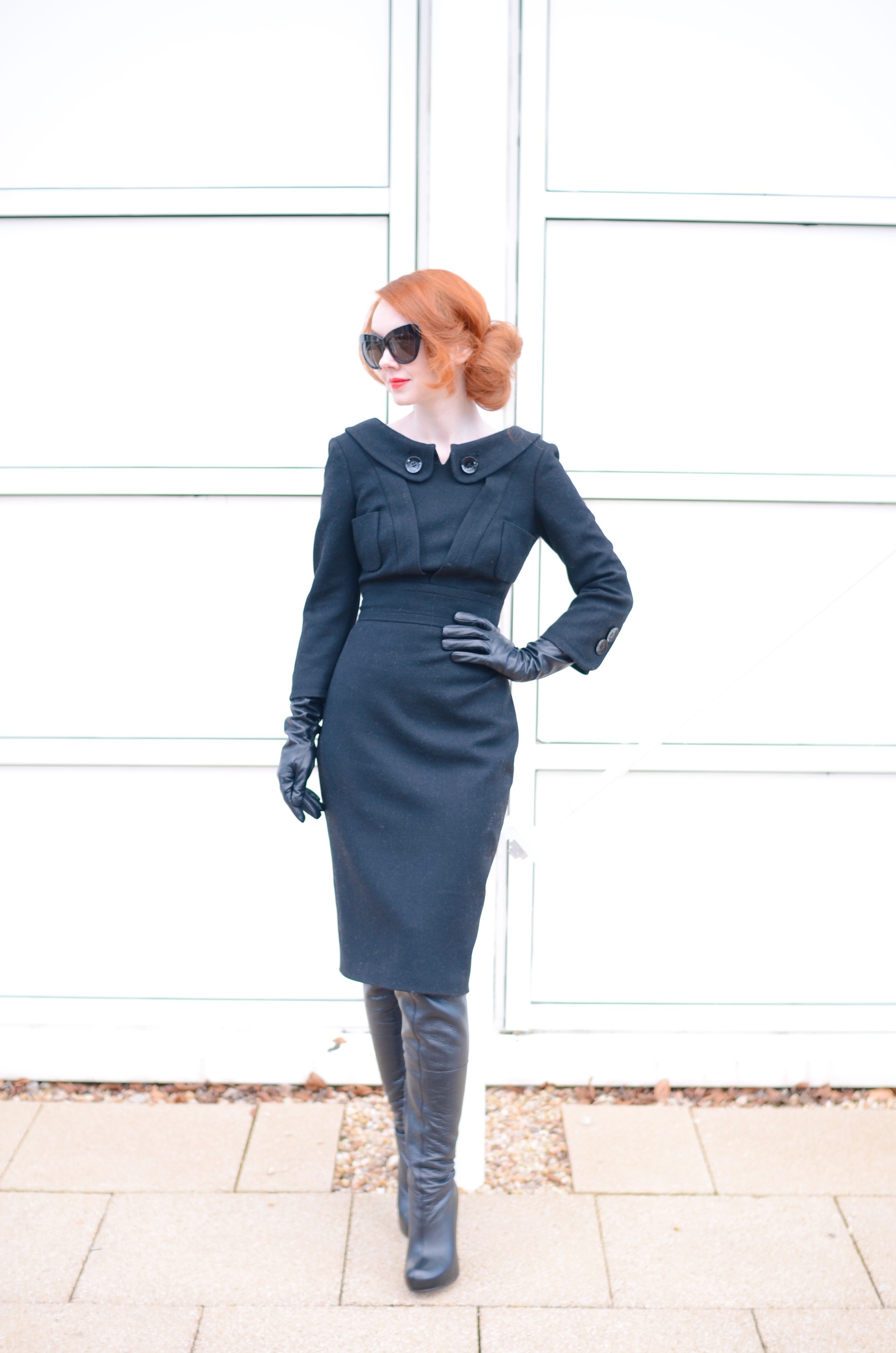 redhead in black 40s style wiggle dress