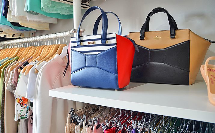 Kate Spade handbags in closet