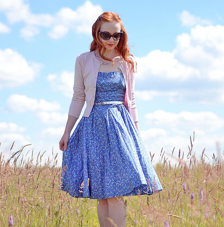 blue strapless summer dress with pink cardigan