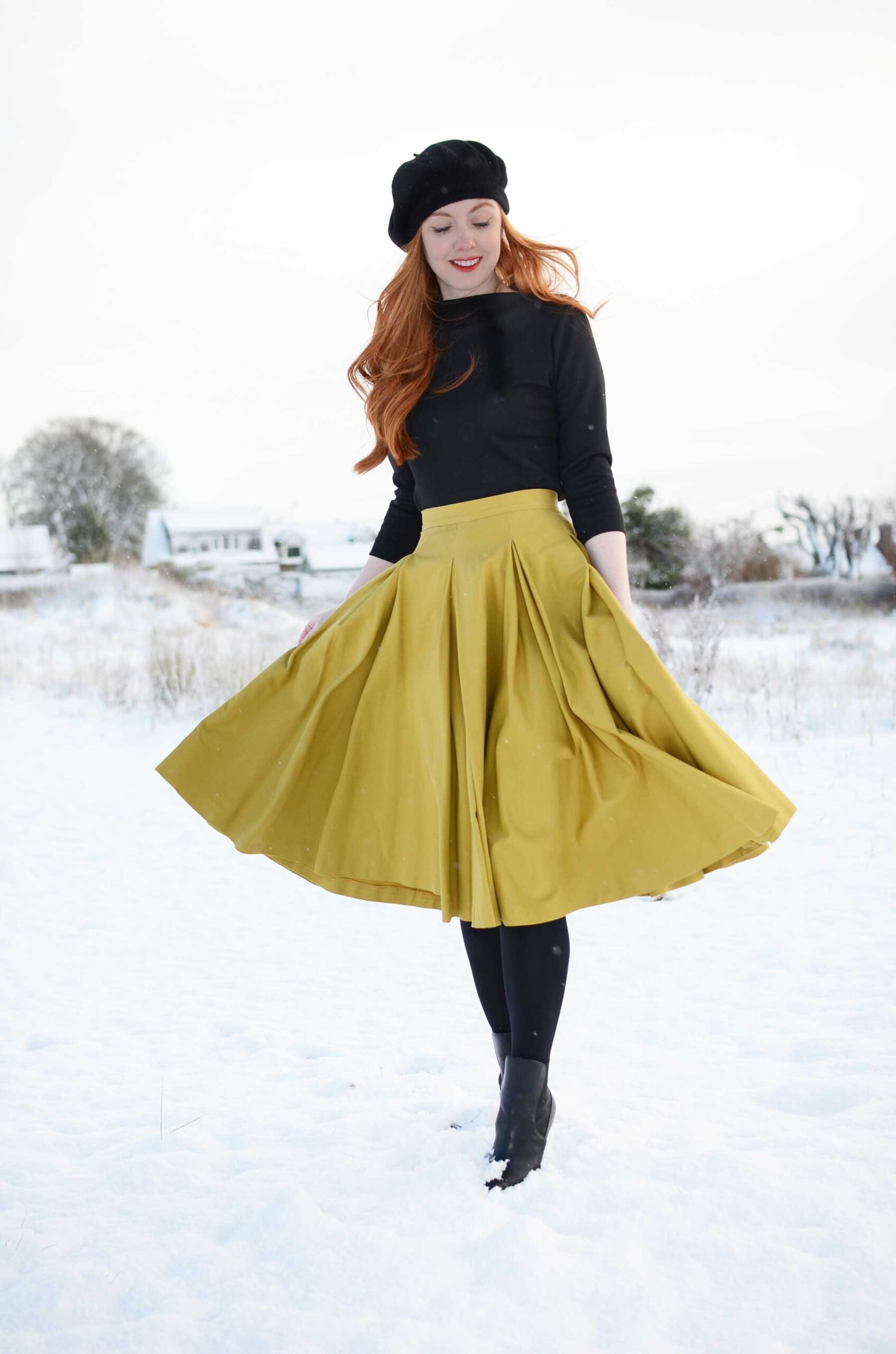 yellow midi skirt in the snow
