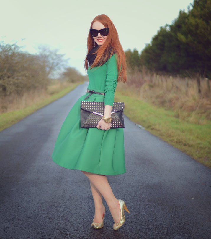 green skirt and sweater