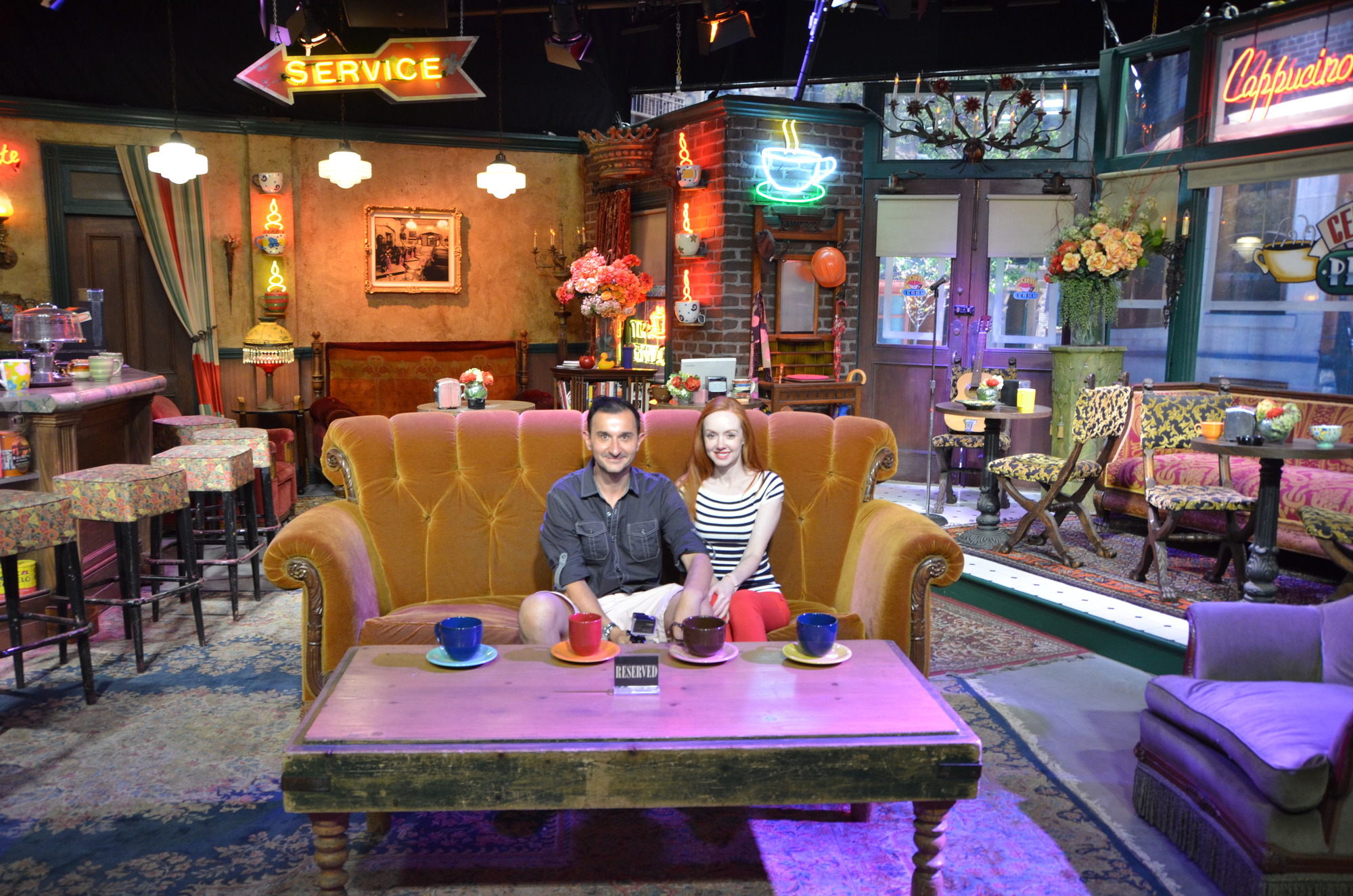 Sitting on the 'Friends' couch as part of the Warner Bros studio tour, LA.