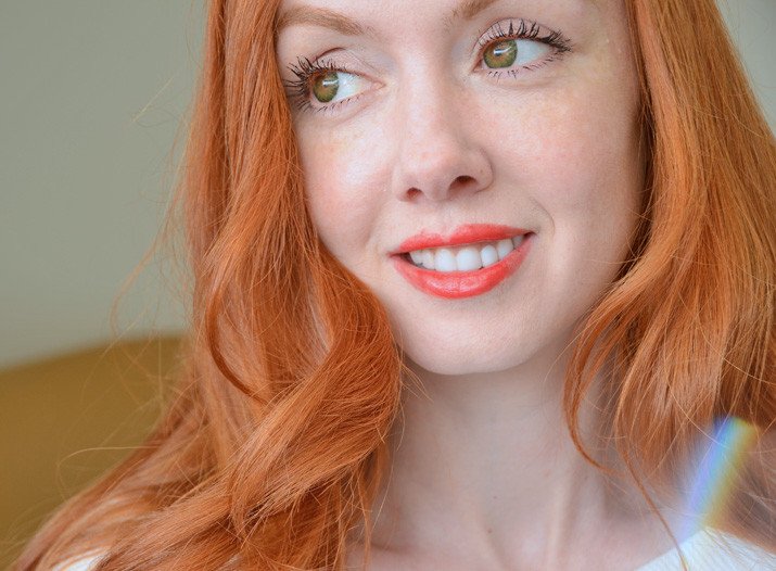 pale redhead with green eyes