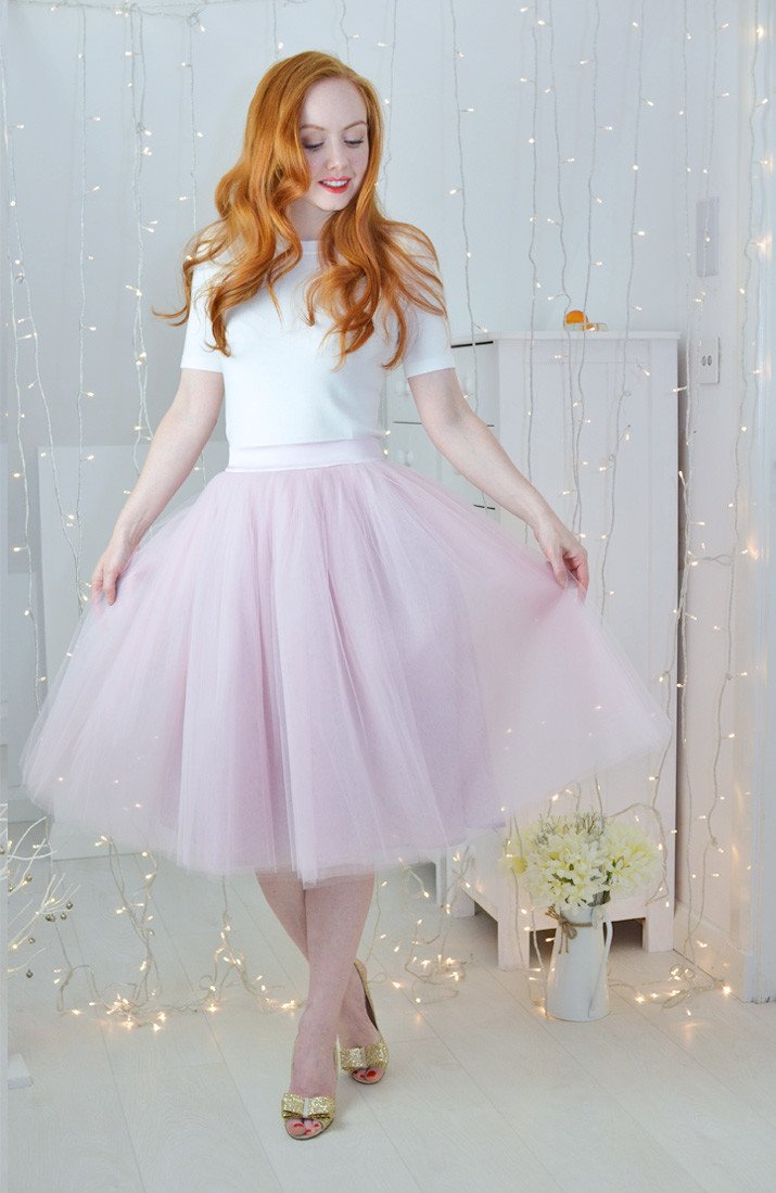 pink tulle skirt with gold shoes and cream top