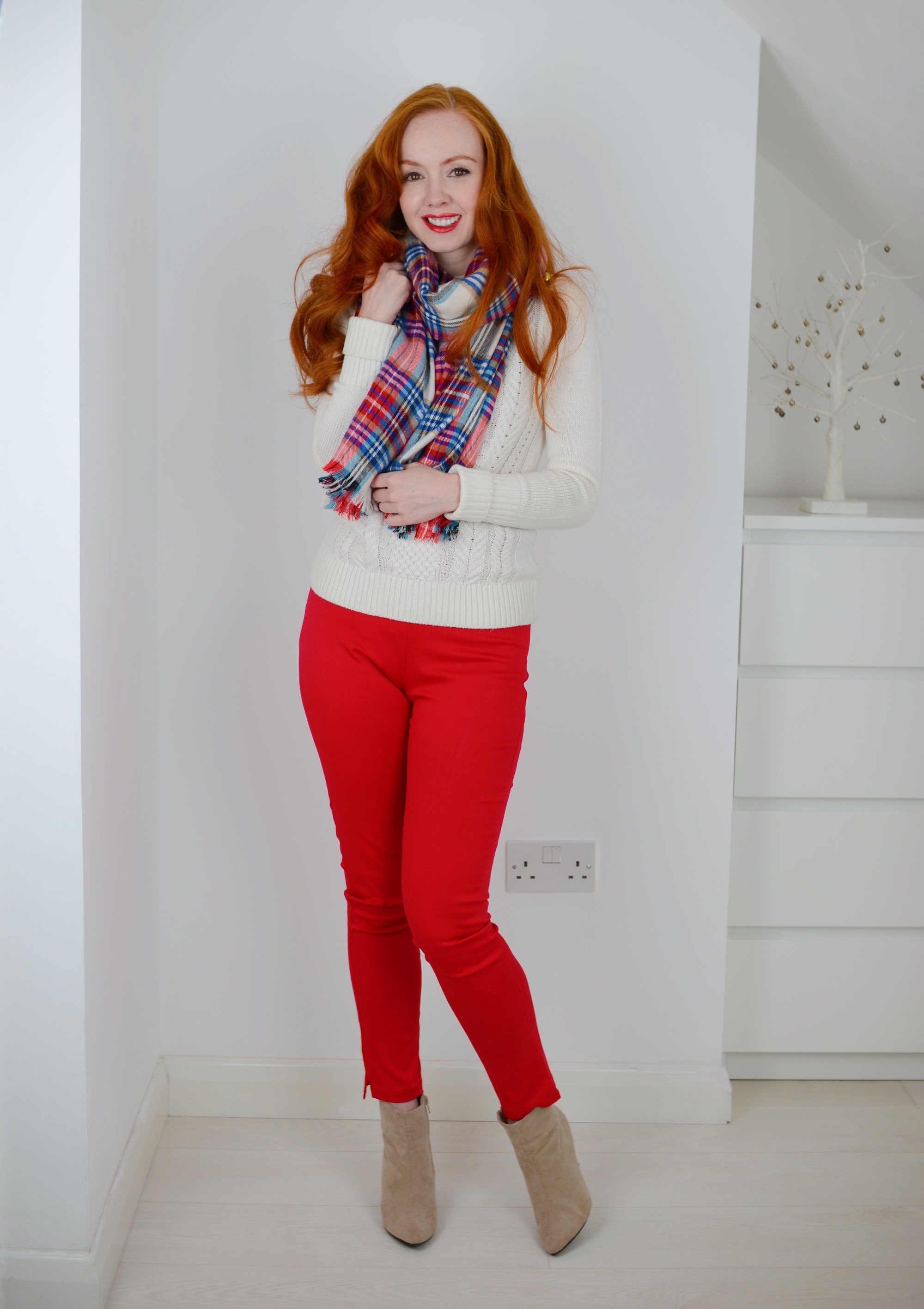 red pants and cable sweater