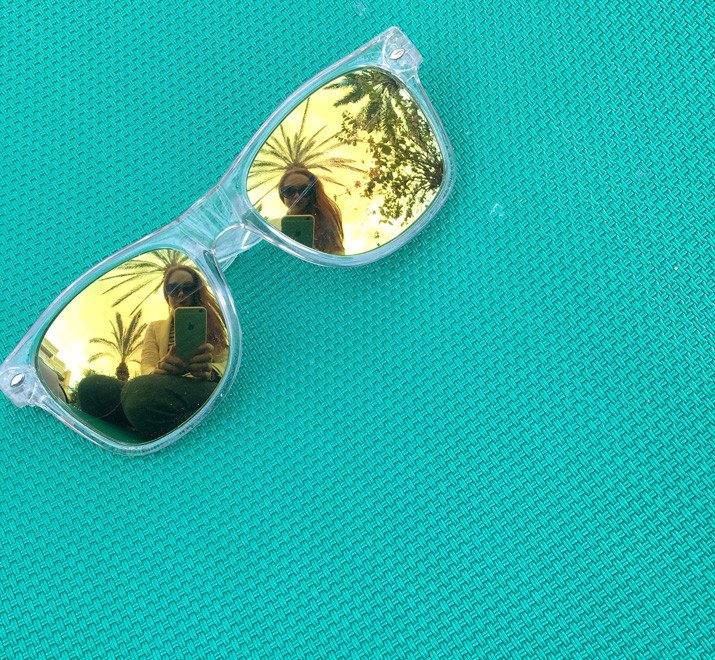 reflection of palm trees in sunglasses - and yes, I DID notice I look like I'm wearing some strange kind of of palm crown...