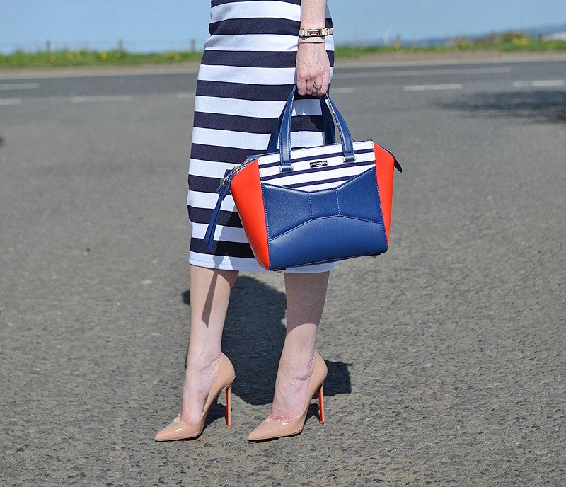 Kate Spade Be Beau bag with stripe skirt and Christian Louboutin Pigalle 120 pumps