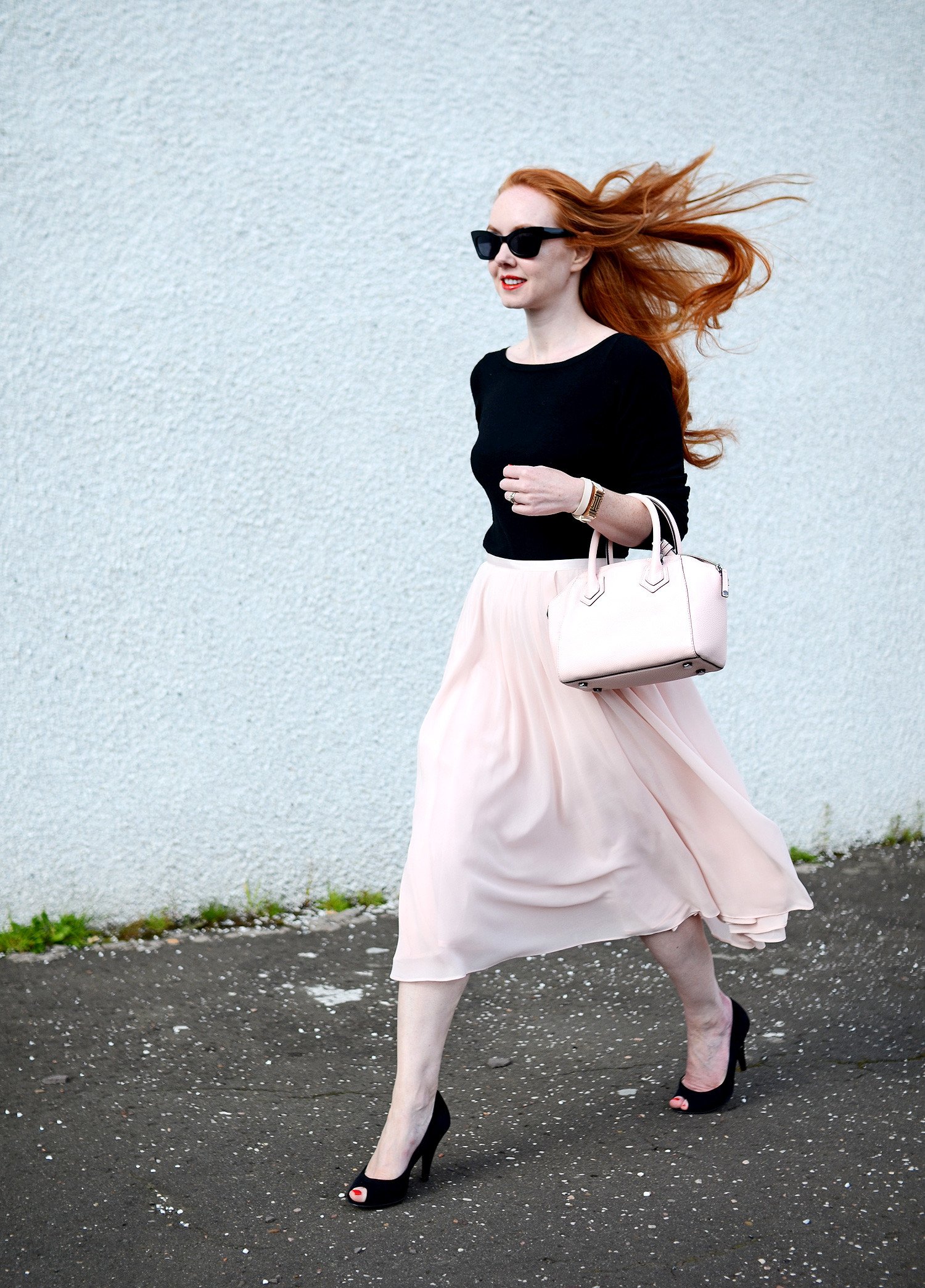 pink chiffon skirt with black boat neck sweater