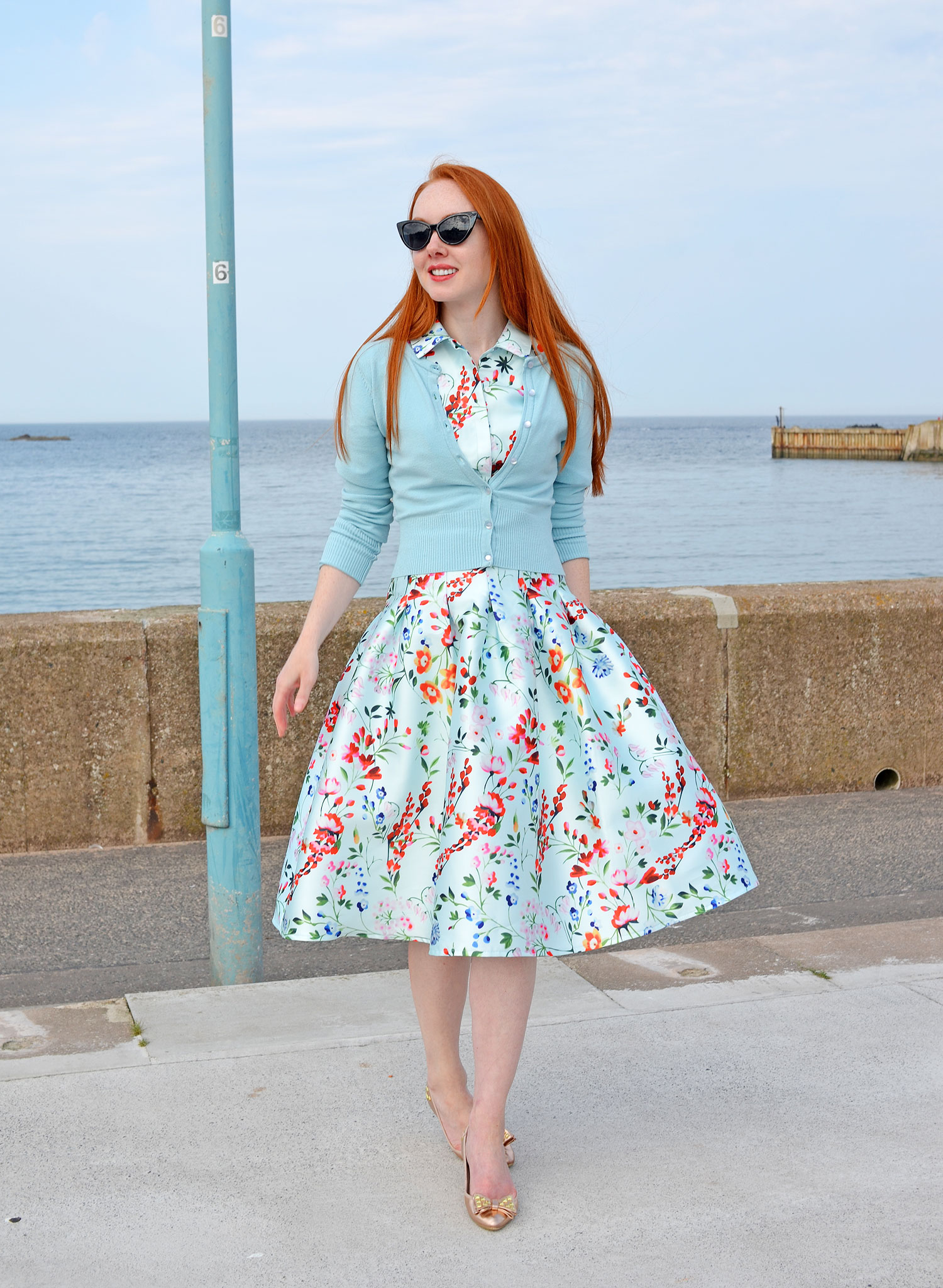 Chi Chi London 'Nora' floral dress worn with blue Hell Bunny cardigan and Kurt Geiger flats