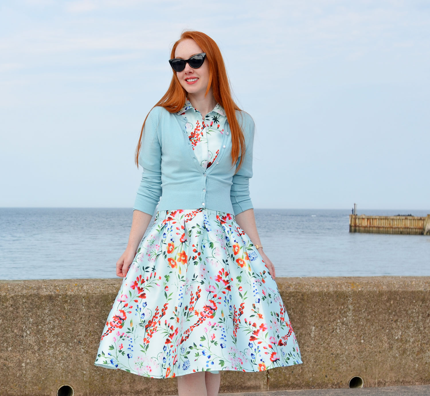 Chi Chi London 'Nora' floral dress worn with blue Hell Bunny cardigan and Kurt Geiger flats