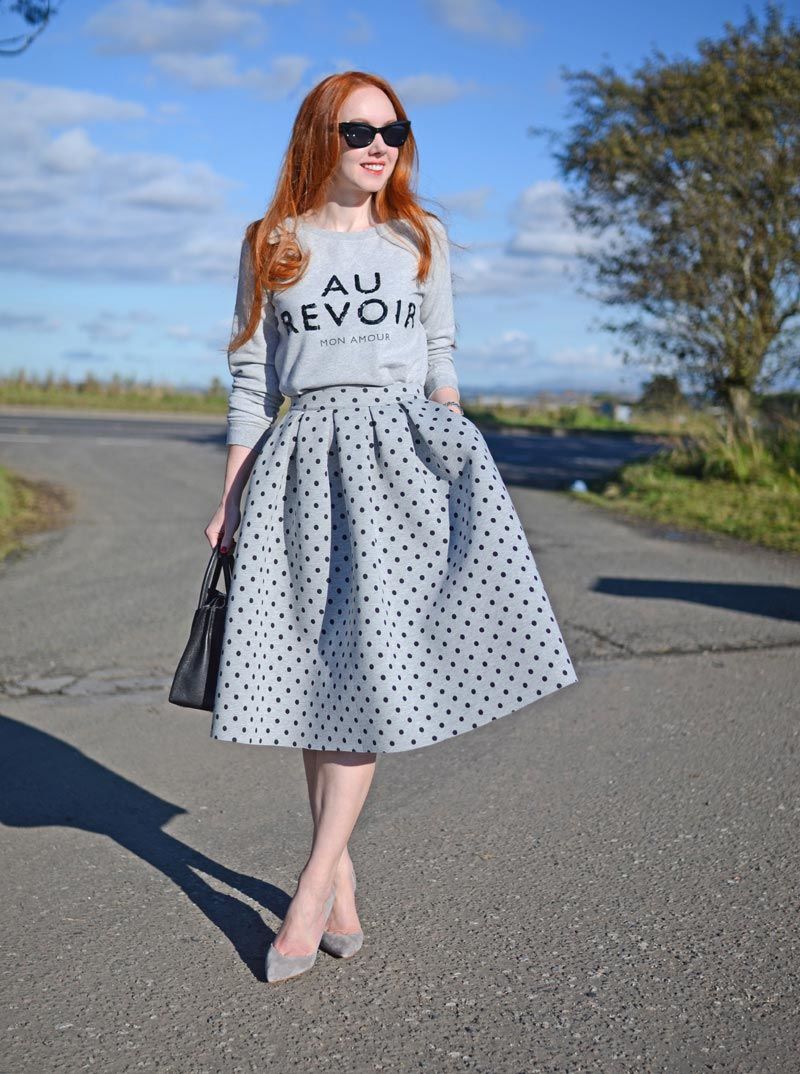 polka dot circle skirt with slogan sweater and high heels