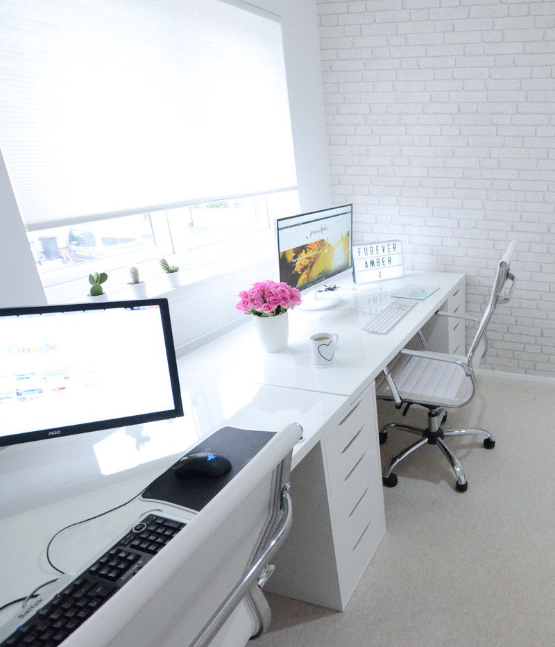 All-white home office with double desks