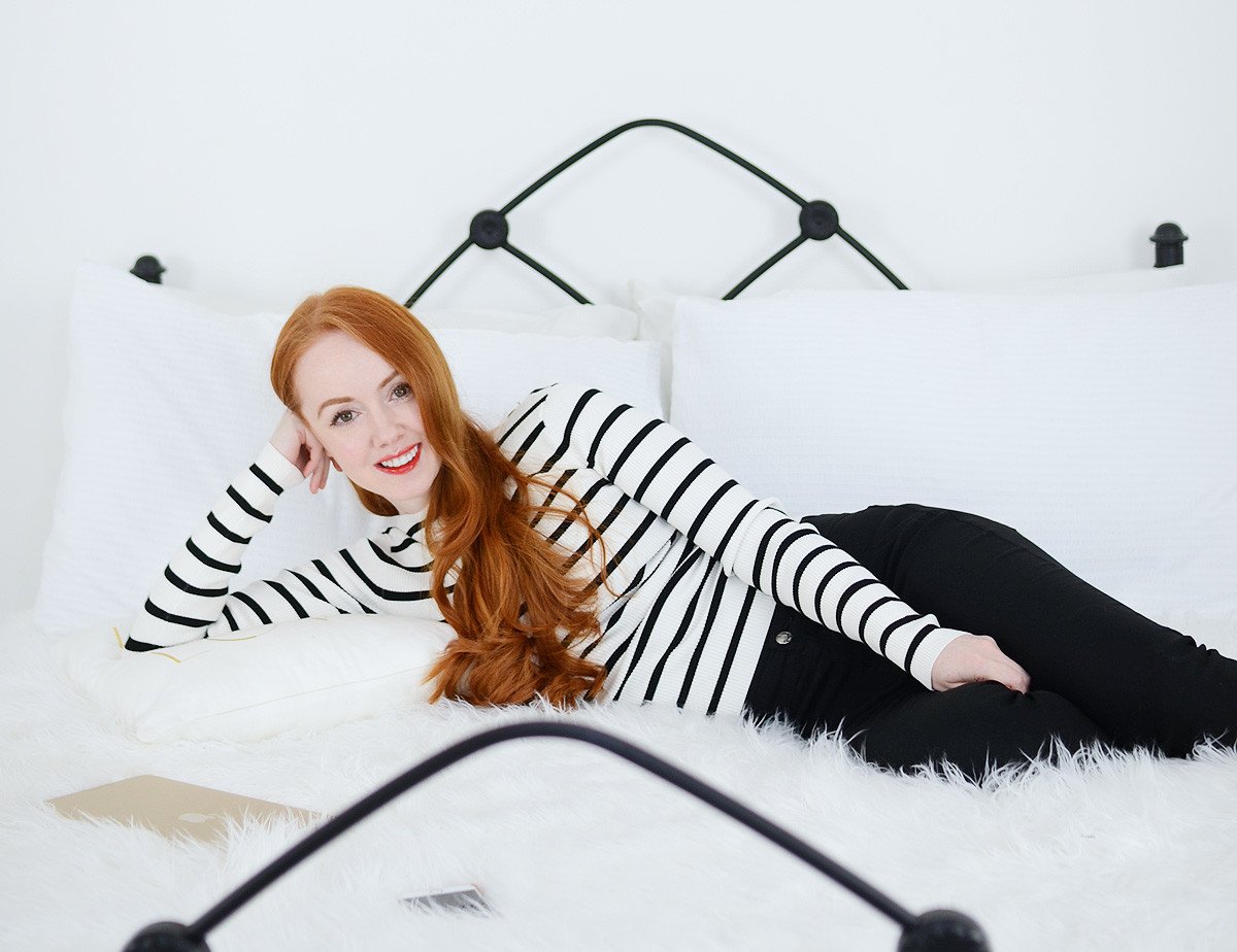 Amber McNaught / ForeverAmber.co.uk wearing black and white stripe top and black trousers