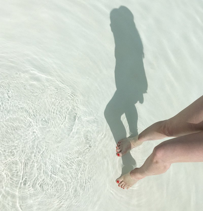 shadow reflected in swimming pool