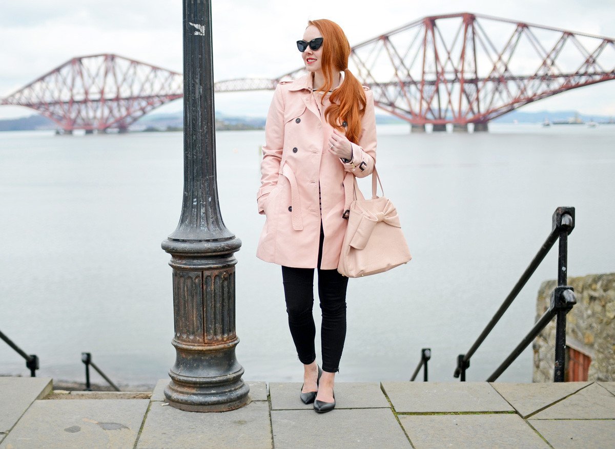 spring outfit idea: pink trenchcoat with black jeans and ballet flats