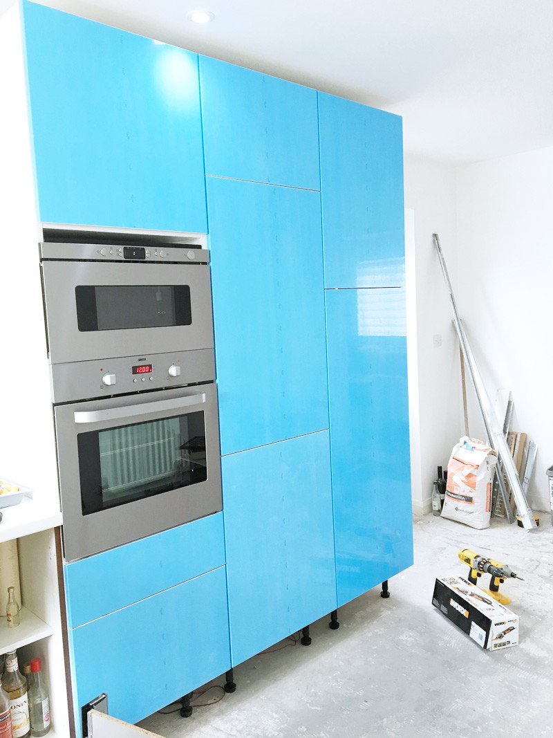 blue shrink-wrapped kitchen