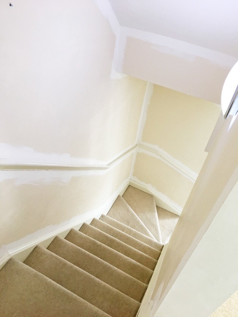 magnolia stairwell being painted white