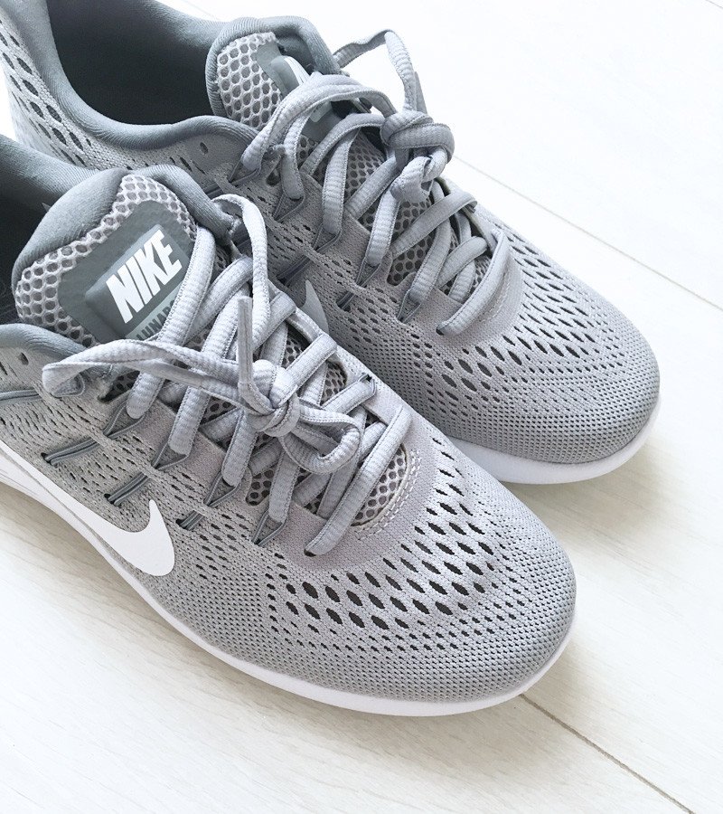 grey Nike running shoes