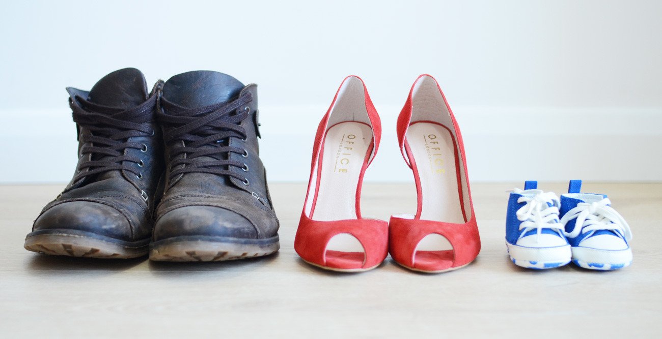 Gender reveal: it's a boy! Three pairs of shoes: his, hers and baby