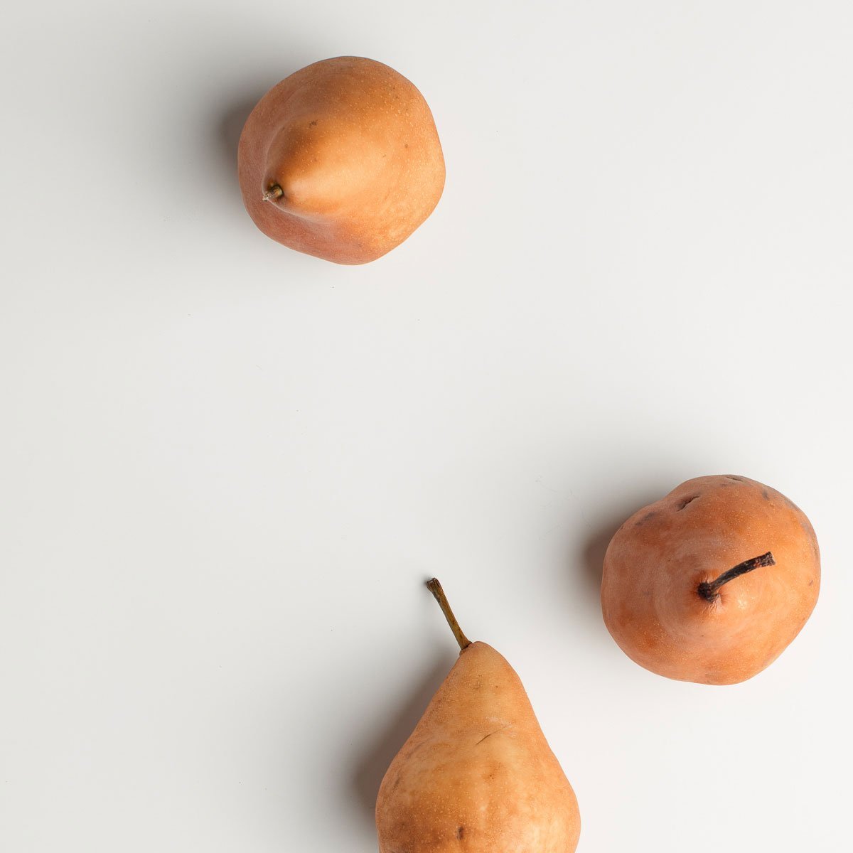 How does posting a random fruit as a Facebook status help raise awareness of breast cancer?