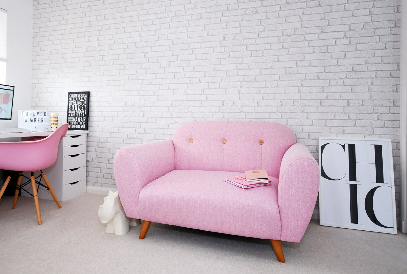 pink DFS sofa in home office