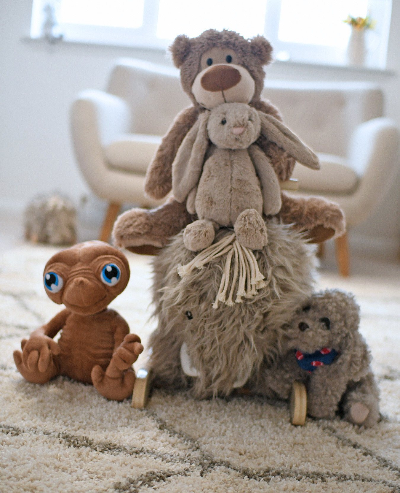 collection of soft toys in baby's nursery
