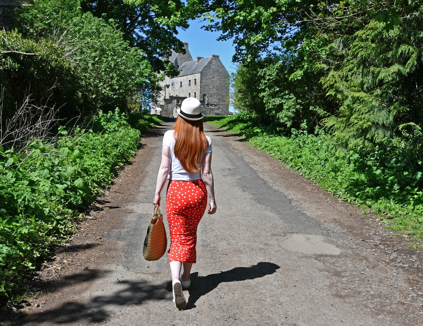 Walking towards Lallybroch - a.k.a Midhope Castle - an Outlander filming location in Scotland