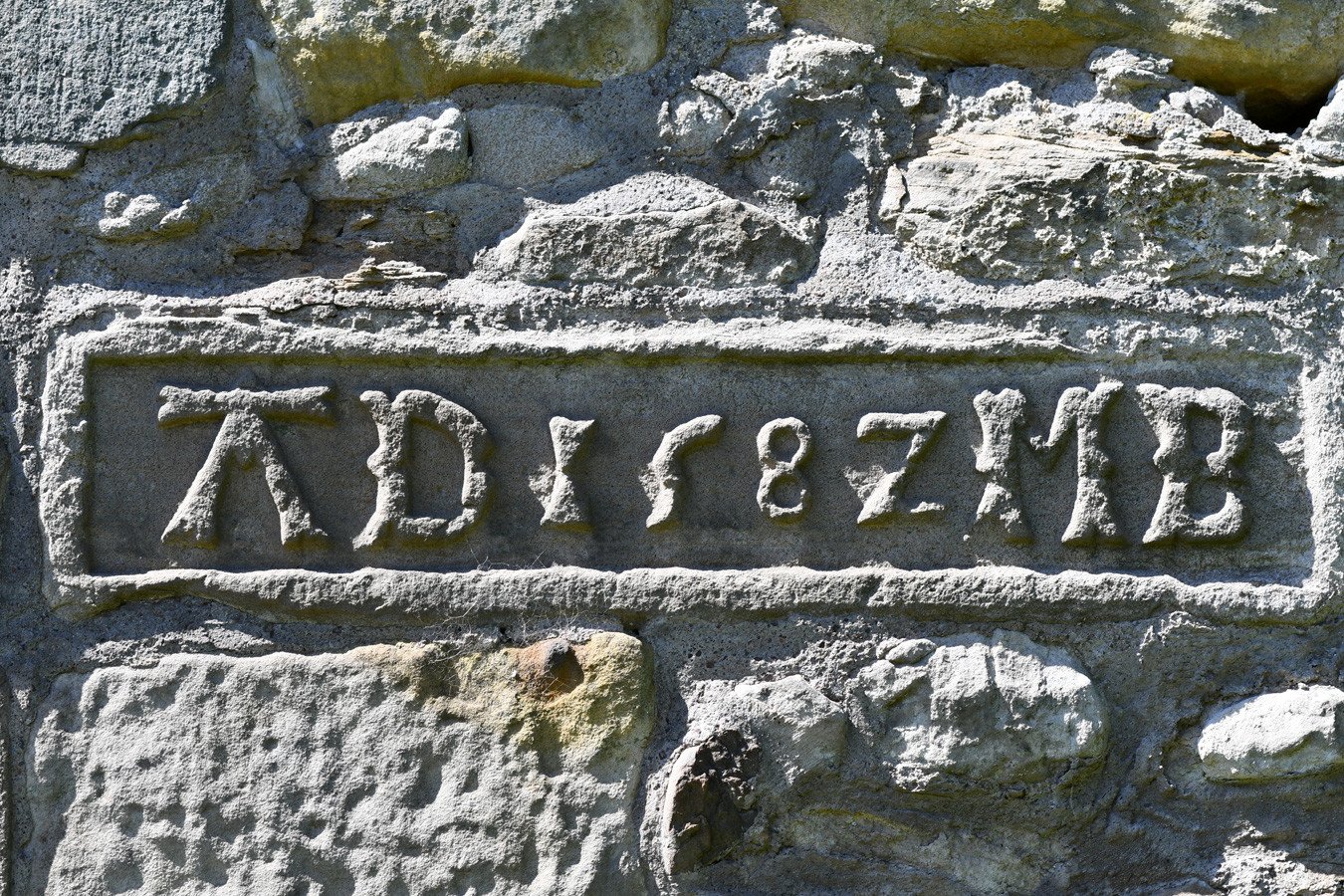 stone carving at Midhope Castle - an Outlander filming location in Scotland