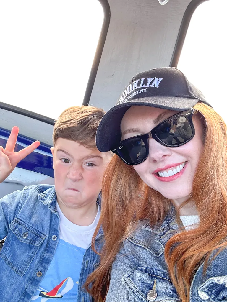 Amber and Max on the boat to Loch Leven