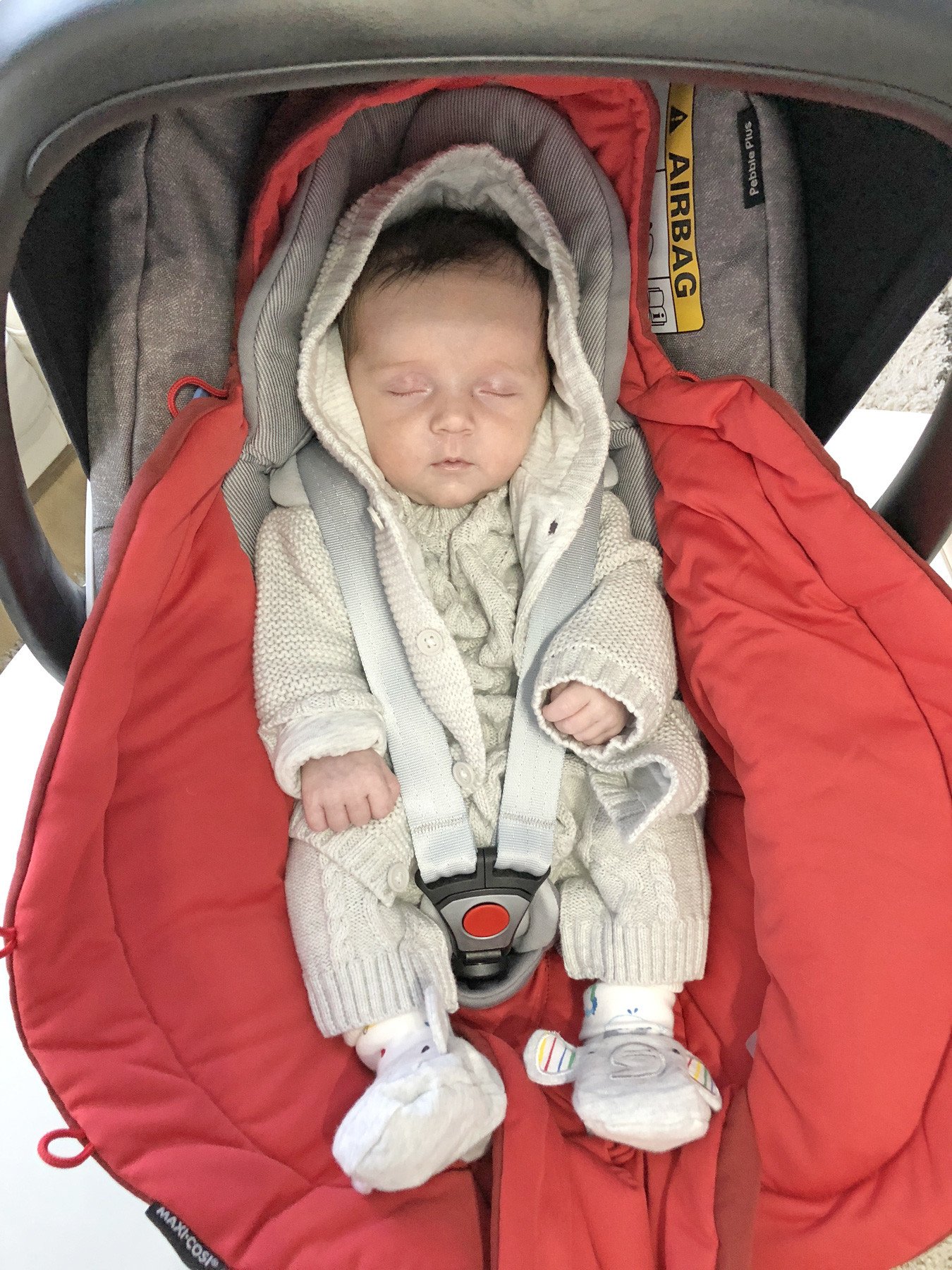 newborn Max in his car seat