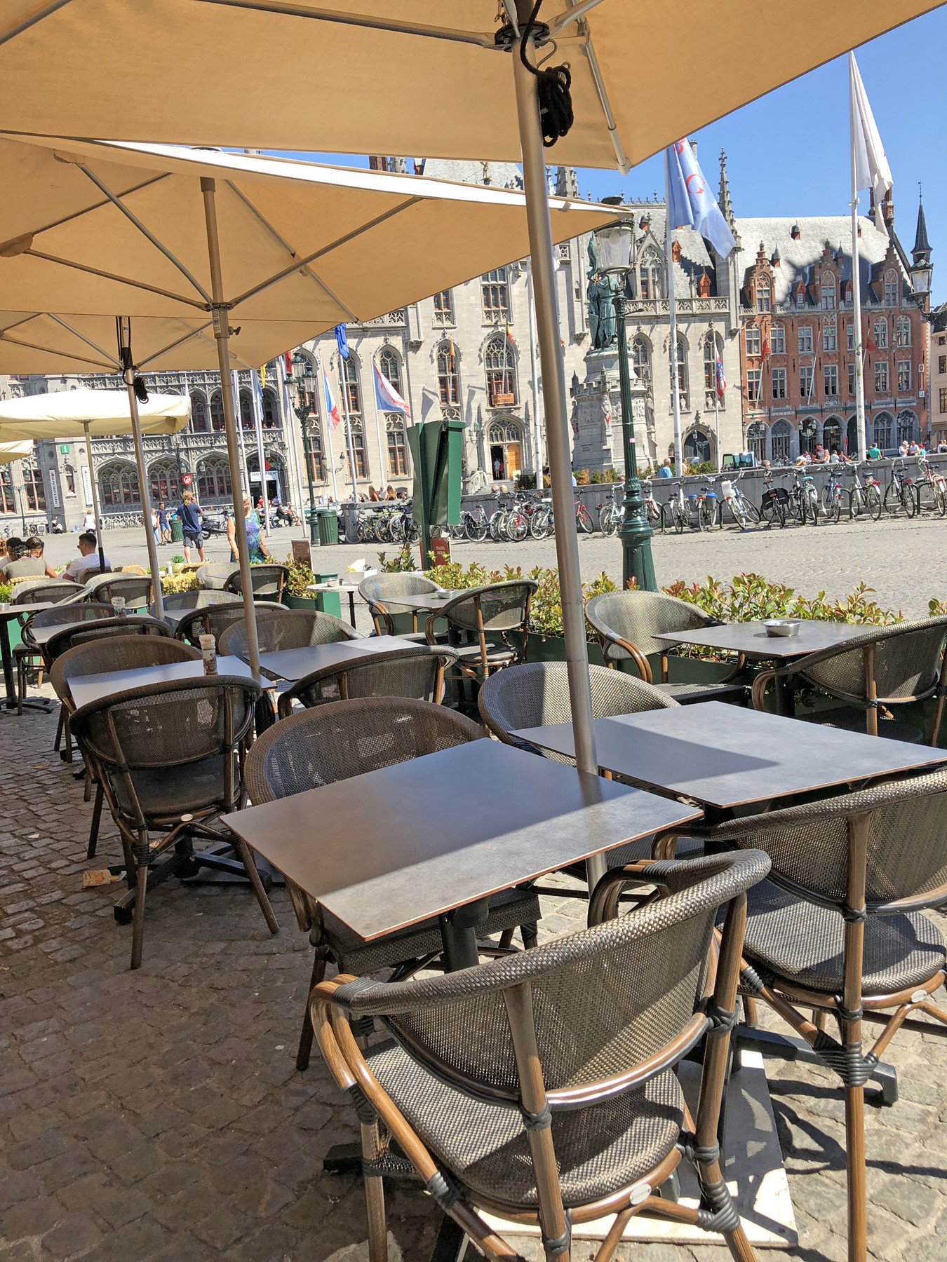 having lunch in Market Square, Bruges, Belgium