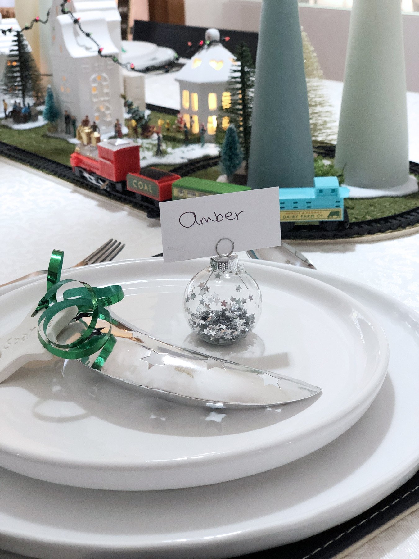 Christmas dinner table centrepiece with working train set
