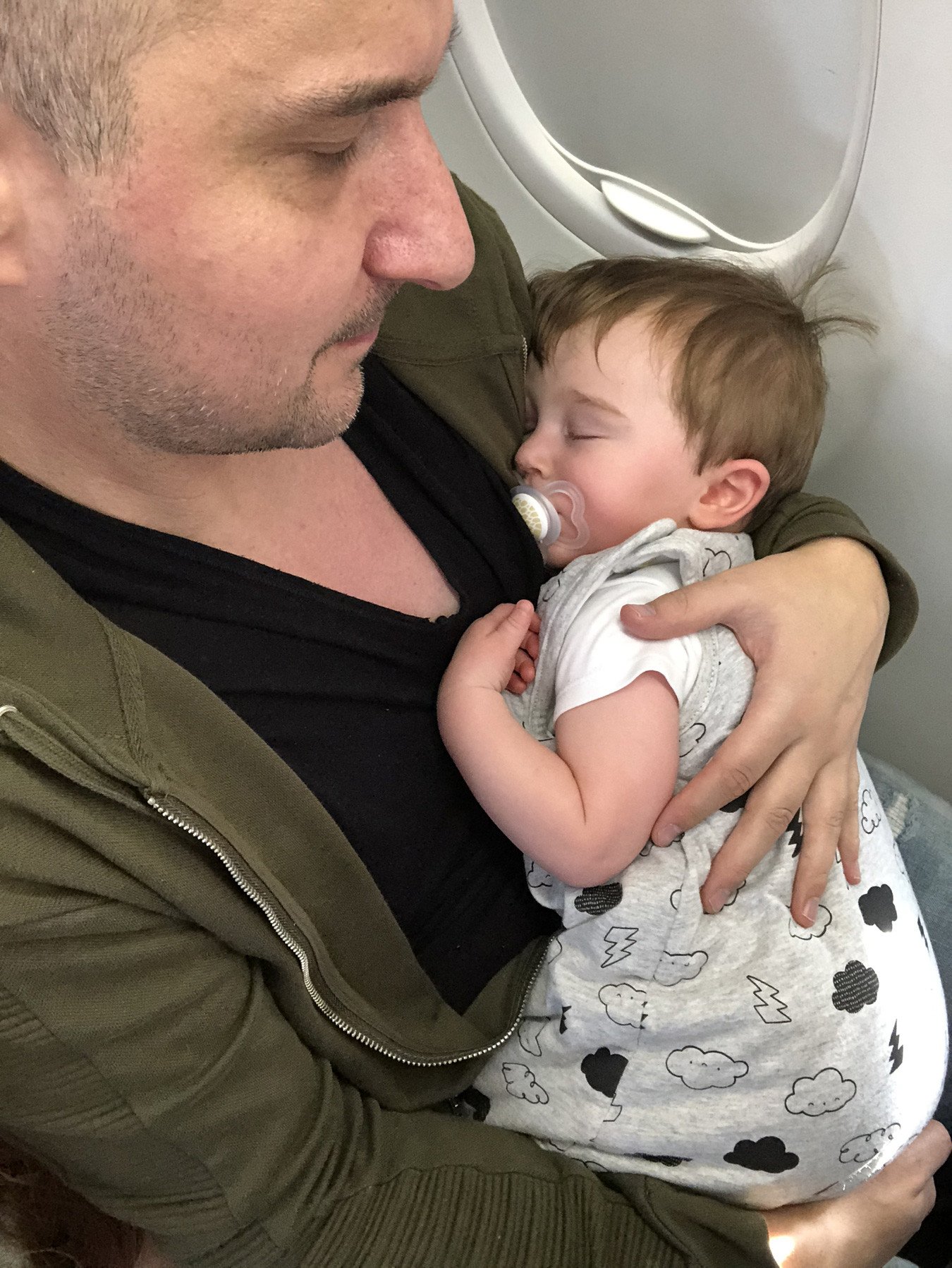 Max sleeping on the plane