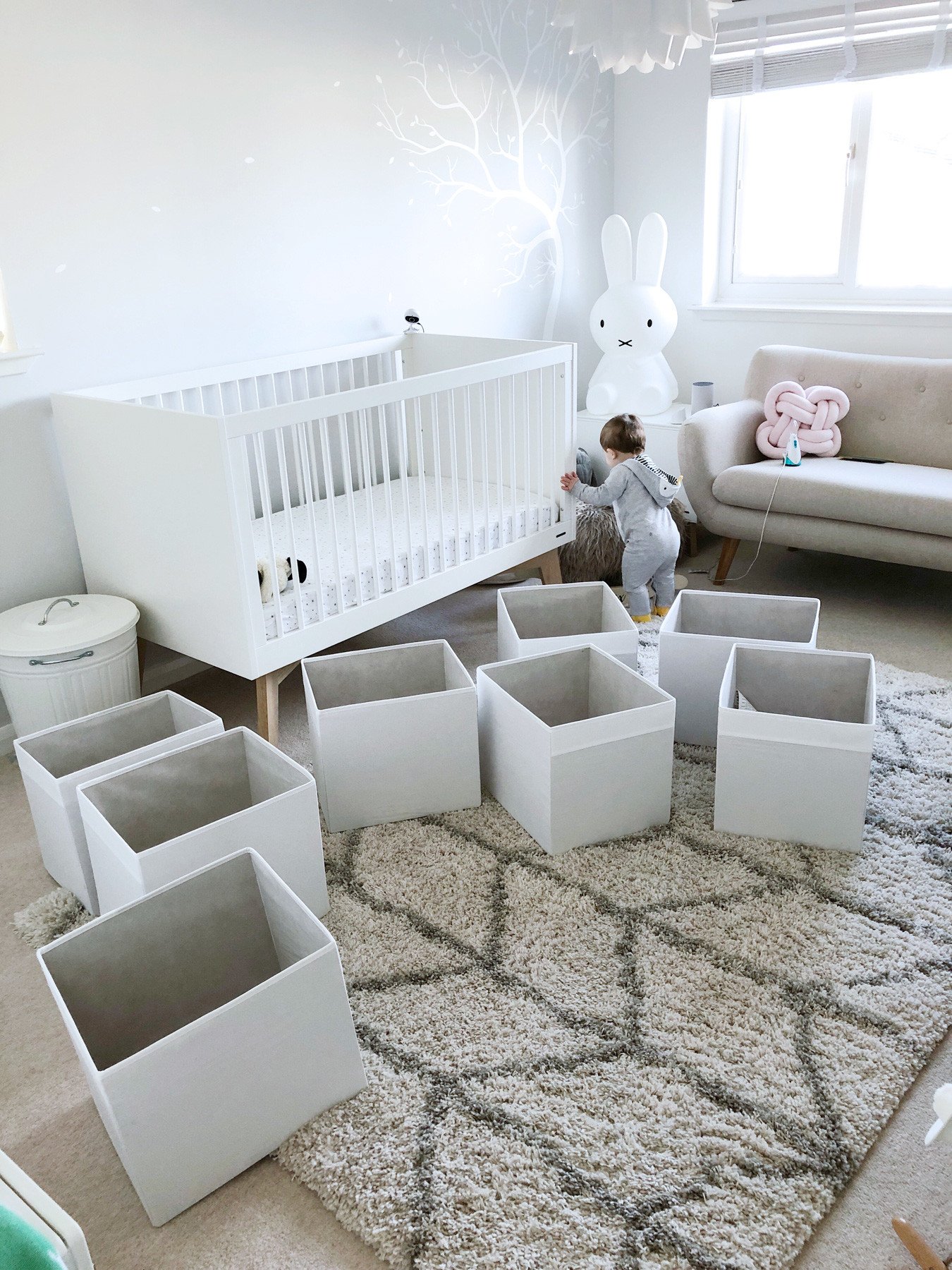 Ikea storage boxes in baby's nursery