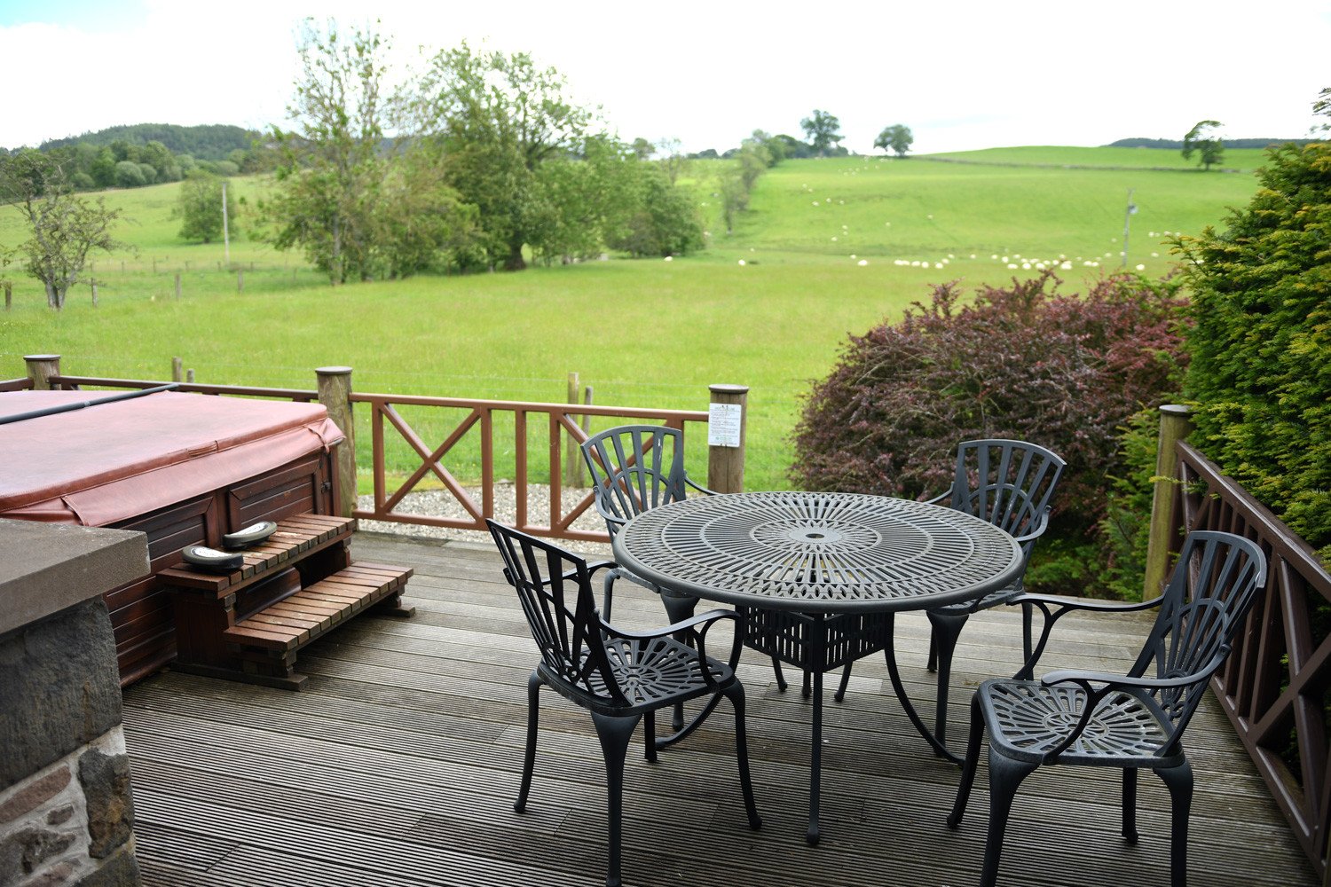 Deck with private hot tub at Highland Heather Lodges, Crieff