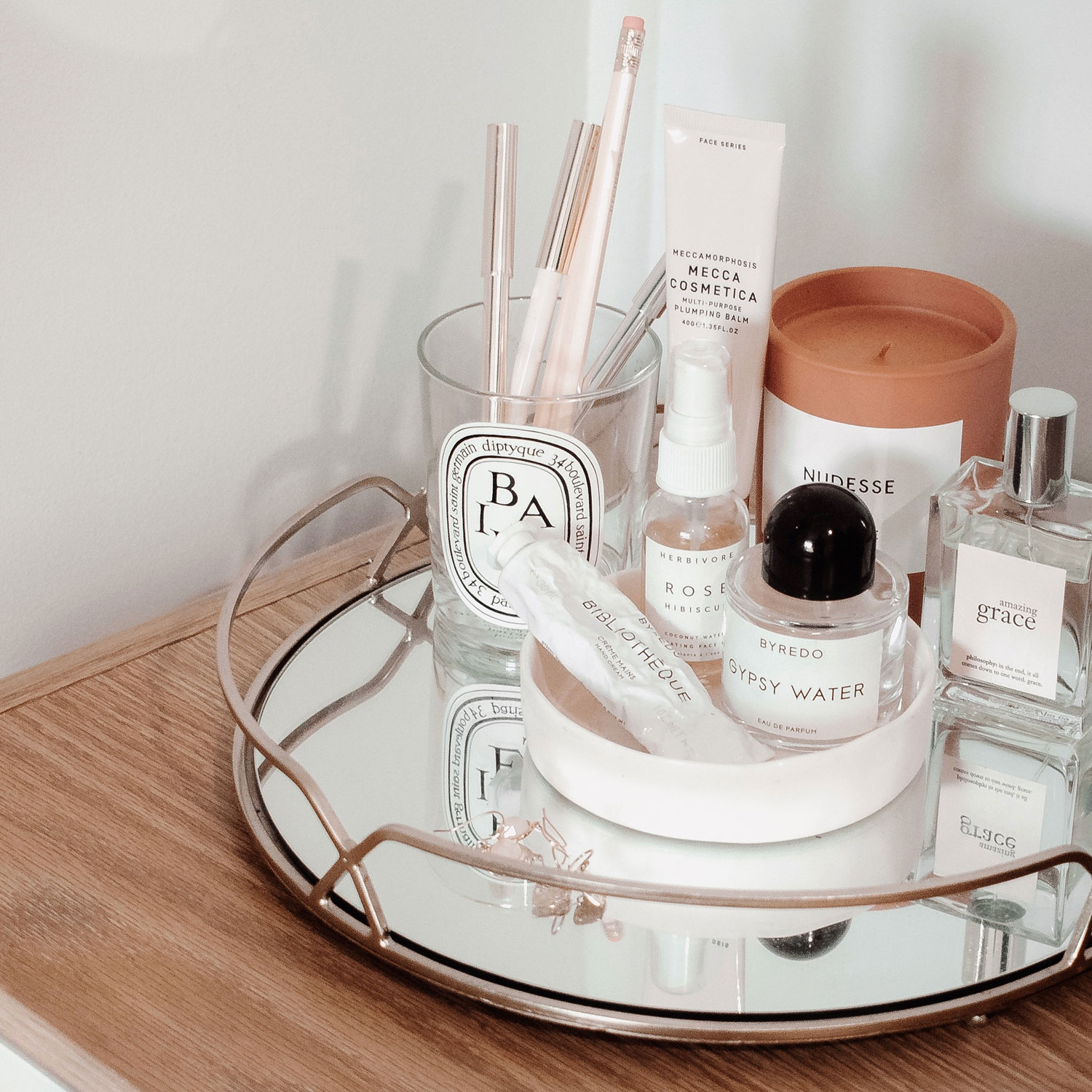 beauty products on bedside table