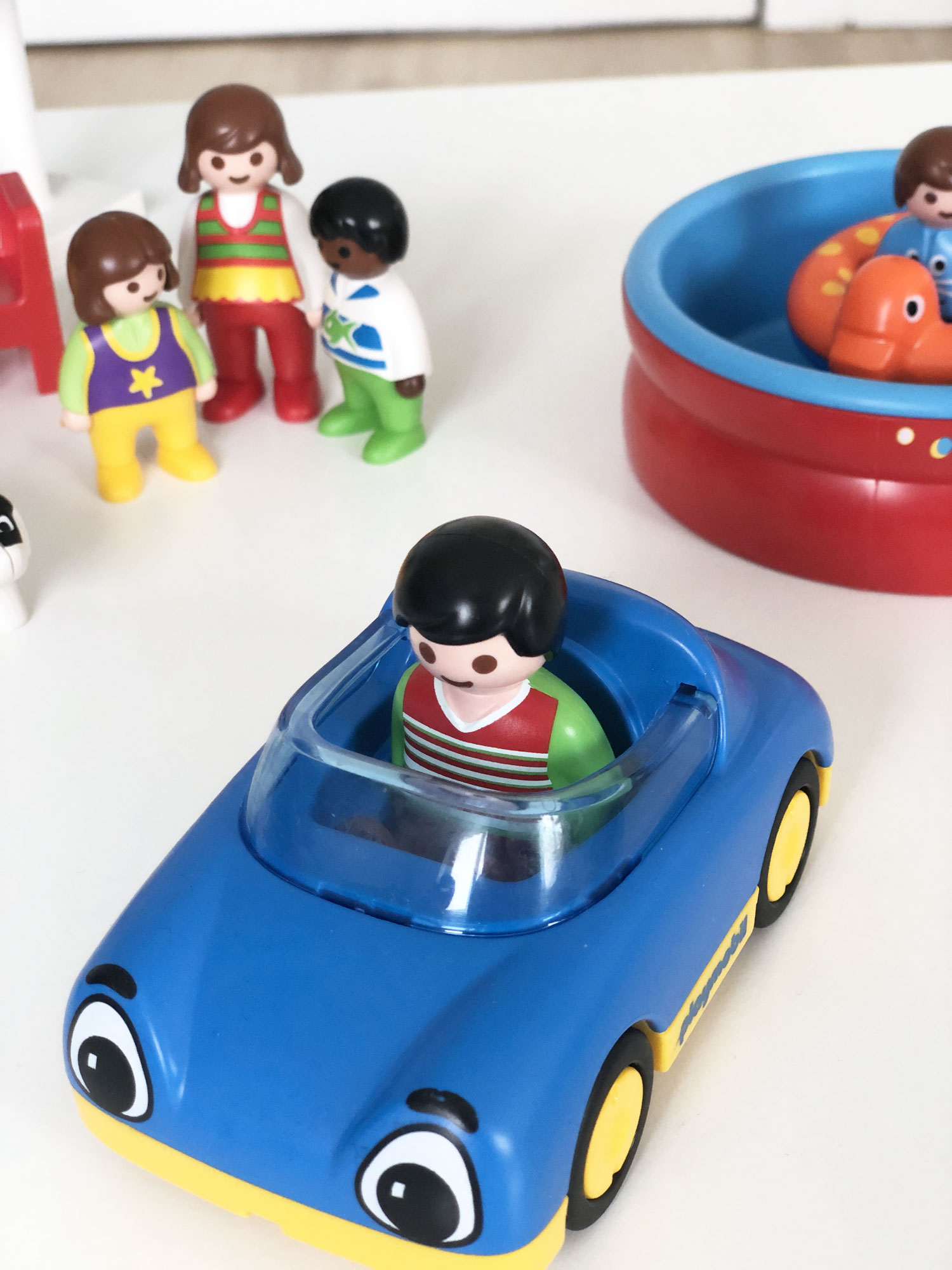 Playmobil figure in car