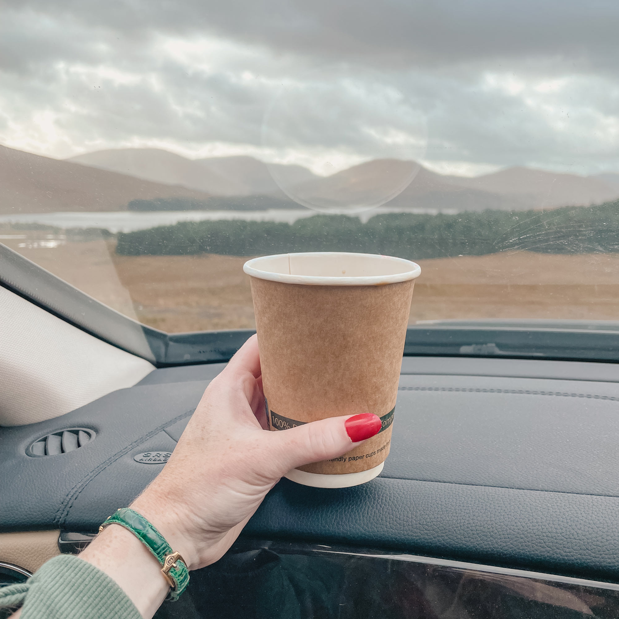 coffee on the dashboard