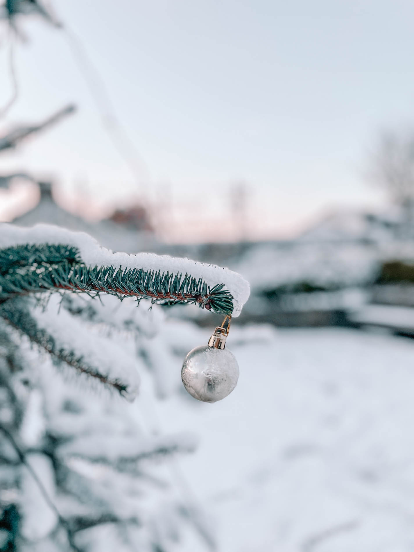 Christmas bauble in the snow