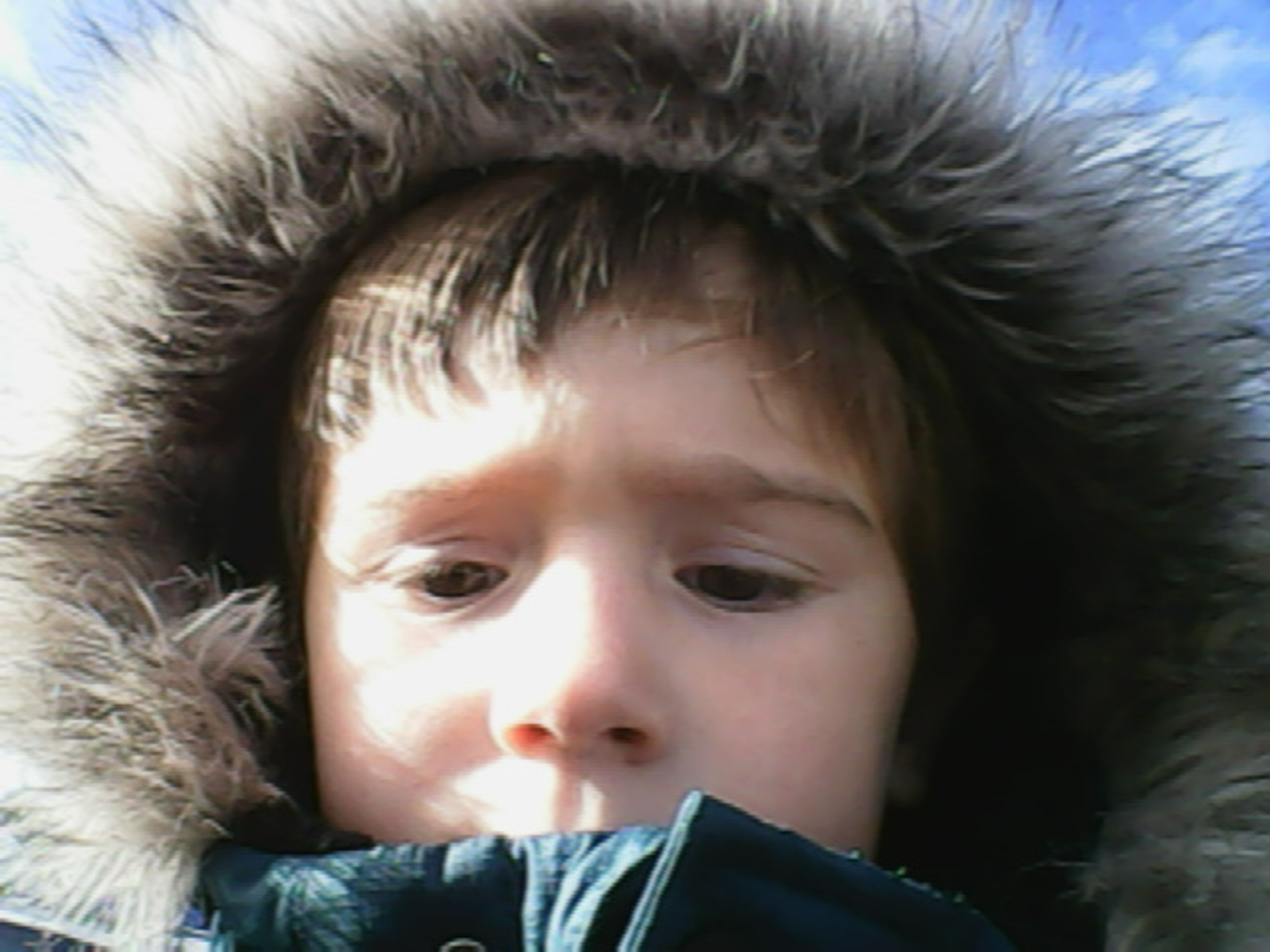selfie of Max wearing a winter coat with a faux fur trim